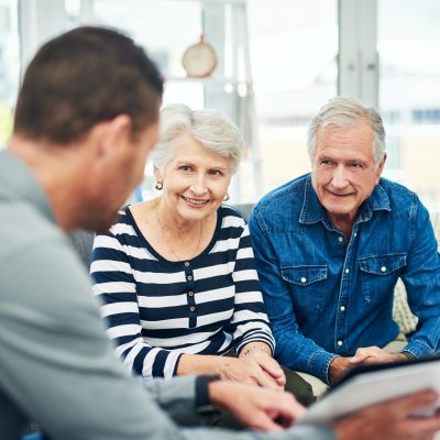 senior couple having a consultation with a financial advisor